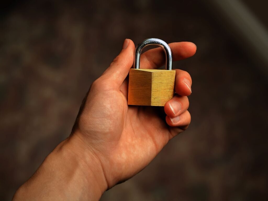 Padlock on a laptop keyboard representing the cost of a cyberattack on a small business in Chattanooga