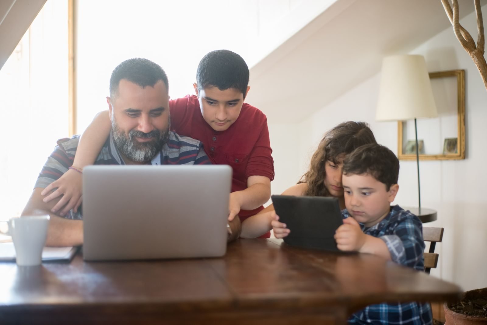 Family streaming and working on multiple devices with reliable whole-home Wi-Fi coverage