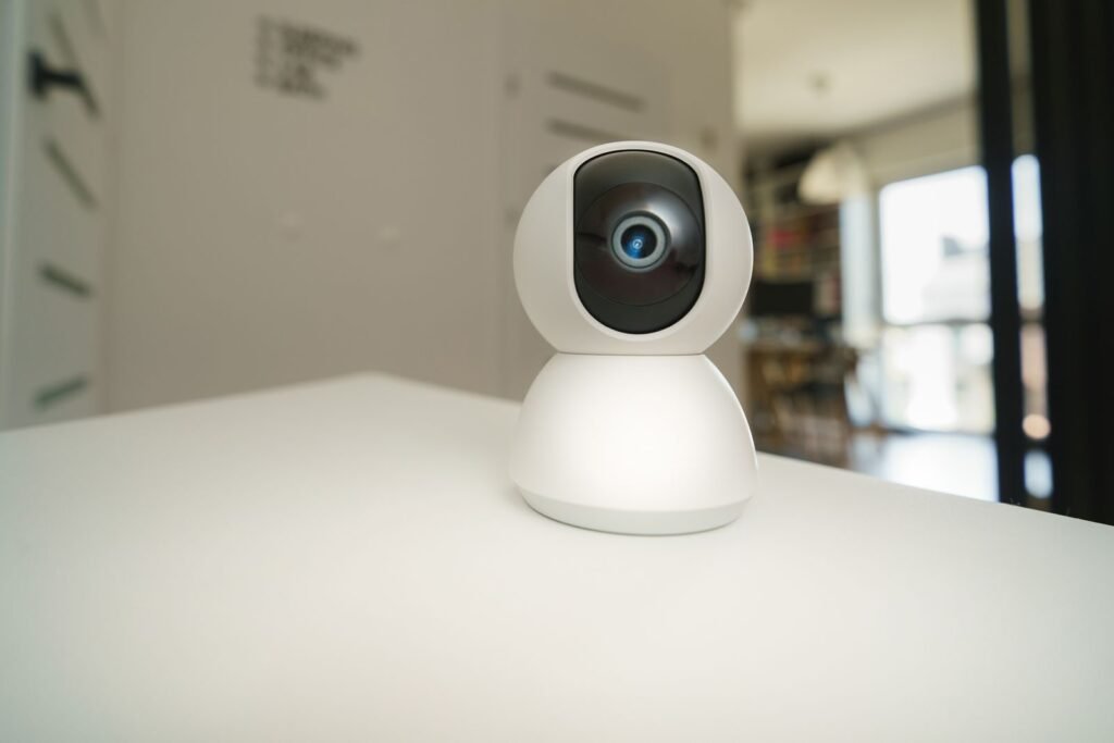 Modern home security camera comparing Ubiquiti and Ring systems