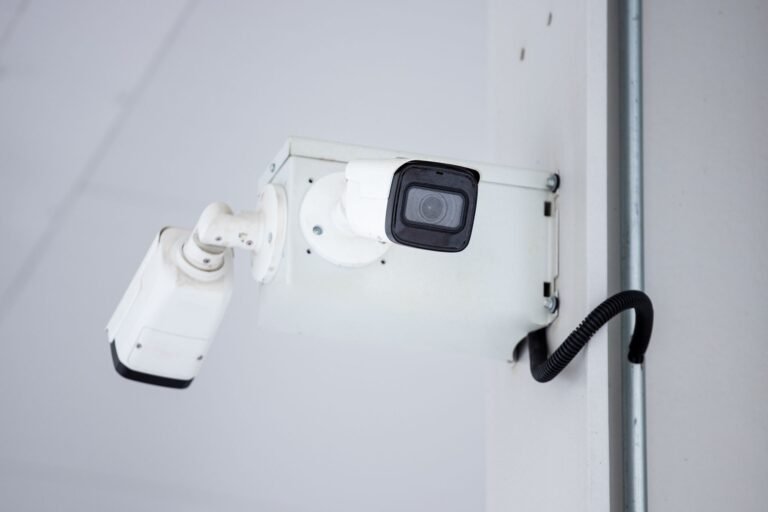 Modern commercial security camera mounted on a business wall in Chattanooga, TN
